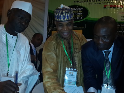 (L-r): Mallam Ibrahim Baba, postmaster-general (Nigeria), Dr. Simon Emeje, deputy postmaster-general and head of Courier Regulatory Department (CRD) and Okey Uba, managing director, Ebony Express, during the 3rd Nigeria Courier Summit held in Lagos on Monday